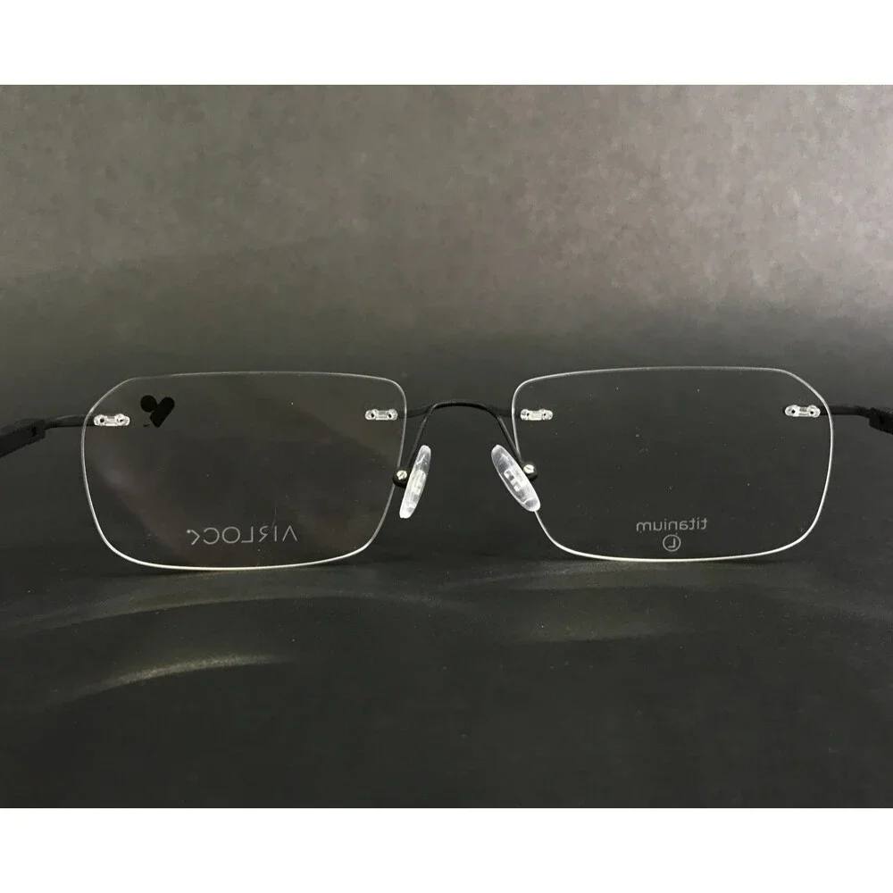 Airlock Eyeglasses Frames Crop 201 002 Black Blue Rimless Titanium 54-18-145